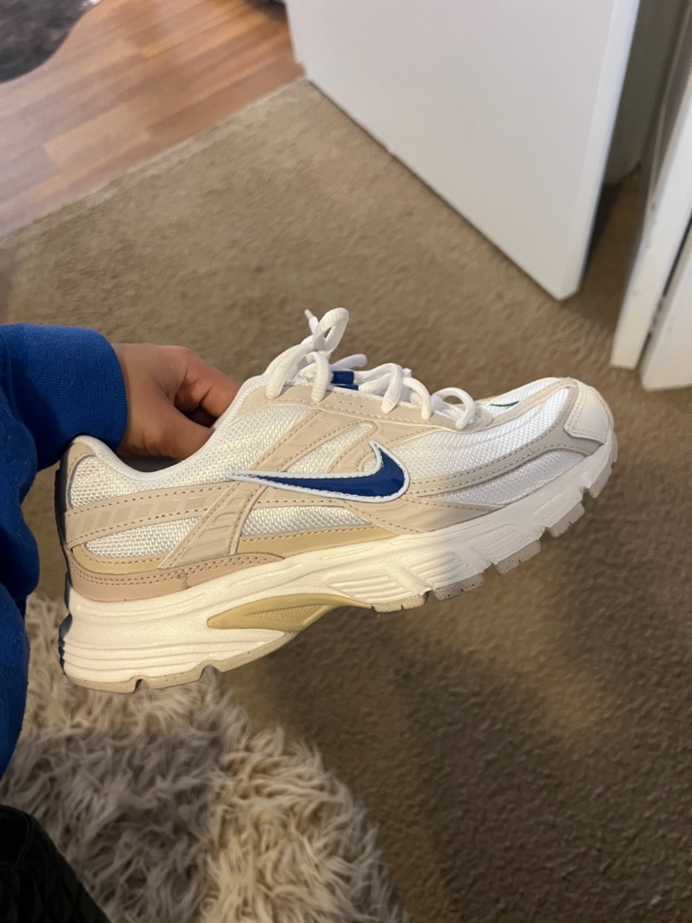 Nike White & Beige Athletic Sneakers with Blue Swoosh